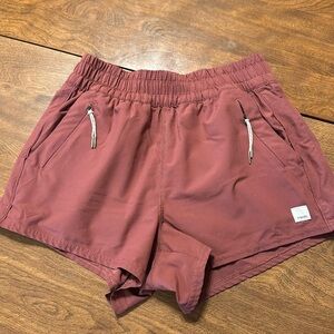 Vuori Women's Shorts in Rust